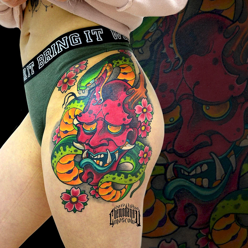 Тату на бедре в японском стиле